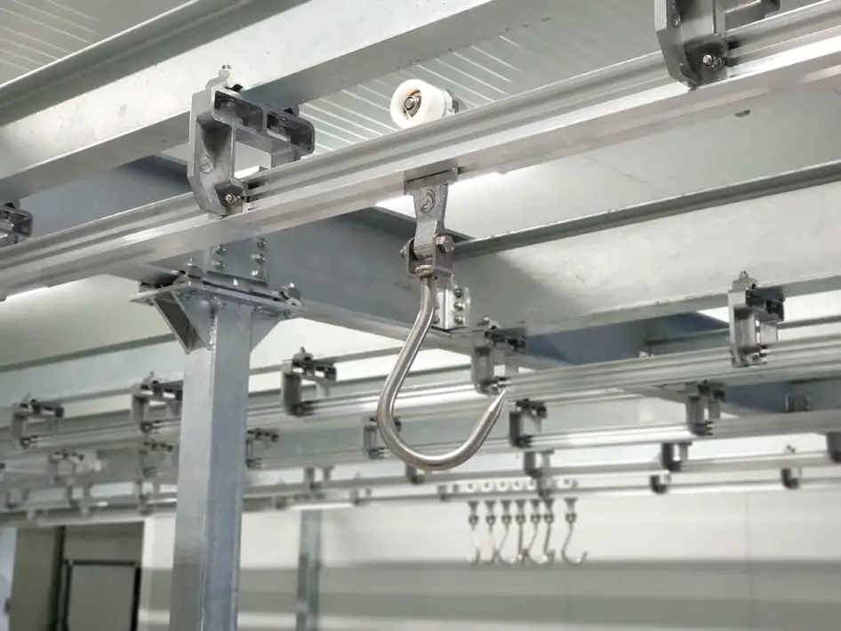 Hook trolley on an installed twin track rail