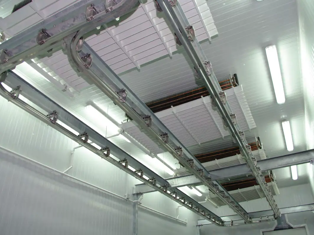 Twin track curves on a cold room ceiling