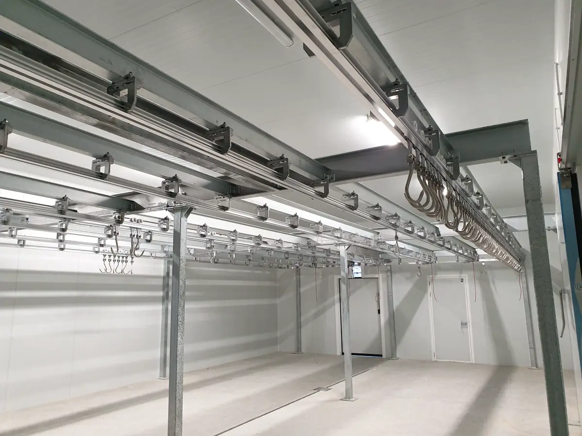 Twin track rail on a steel structure in an empty room